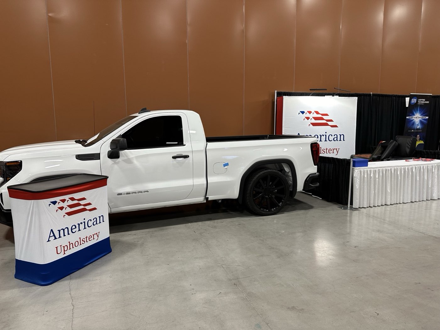 American Upholstery display booth at an industry trade show