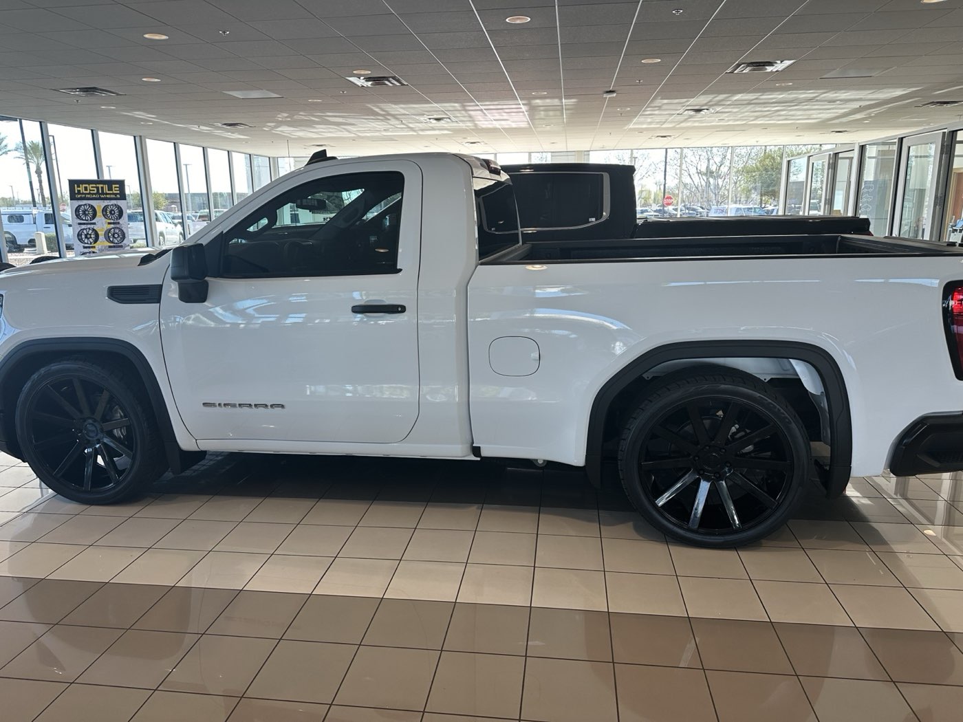 American Upholstery service truck at a dealership visit