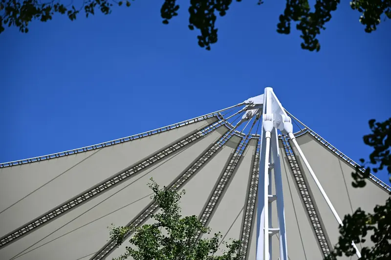 Tensioned fabric membrane structure against the sky
