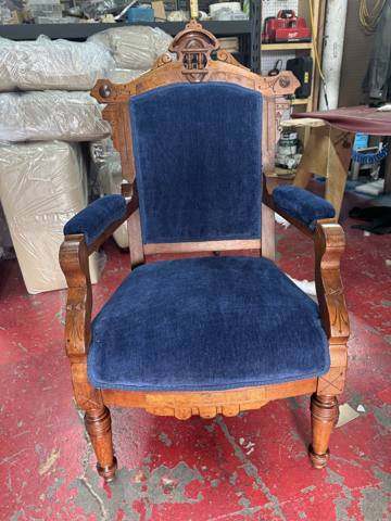 After: carved antique armchair in navy velvet, finished