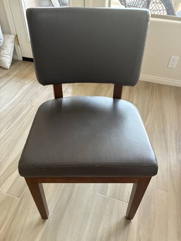 After: dining chair in charcoal vinyl, finished