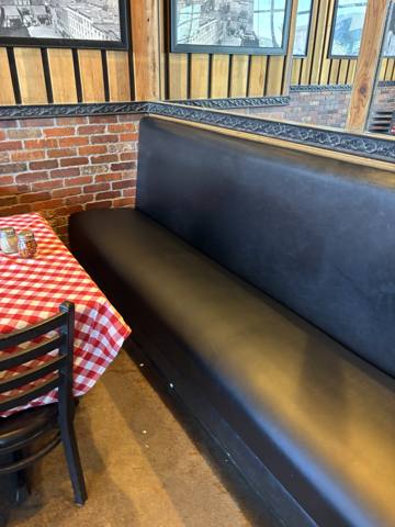 After: black vinyl restaurant bench, end view