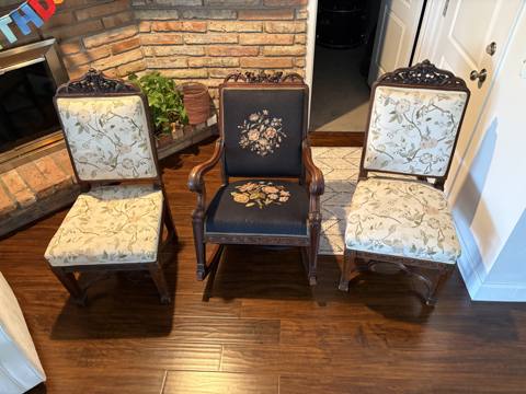 After: three carved antique chairs in floral and needlepoint