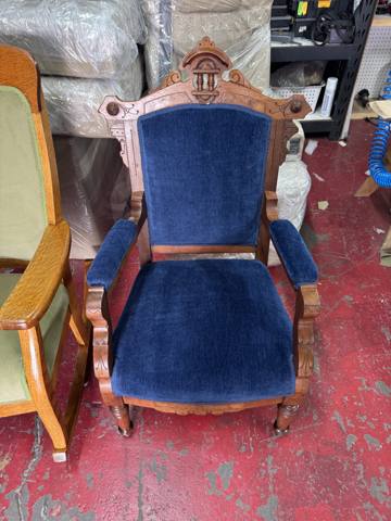 After: carved antique armchair in navy velvet, finished
