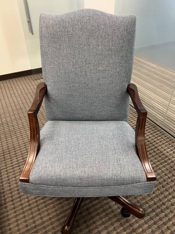 After: gray tweed office armchair with wood arms, finished