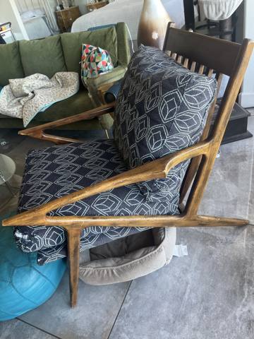 After: mid-century lounge chair, navy geometric cushions