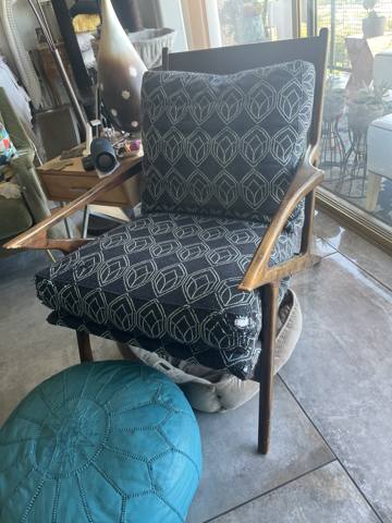 After: mid-century chair with navy patterned cushions