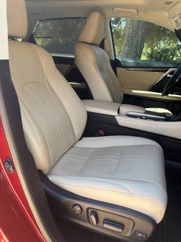 After: cream leather SUV front seat