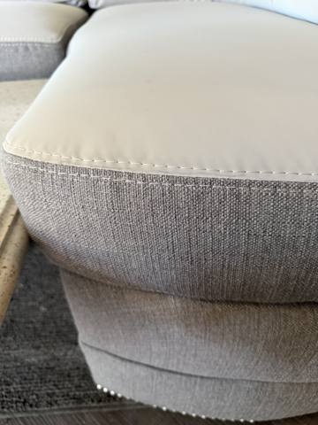 After: two-tone white vinyl and gray tweed cushion detail