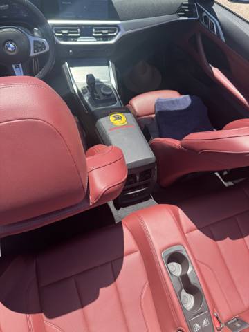 After: red leather car interior with console