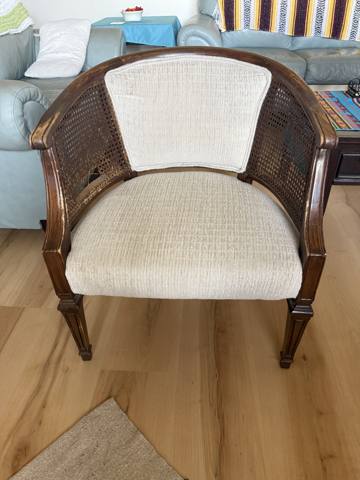 After: cane barrel chair in cream textured fabric