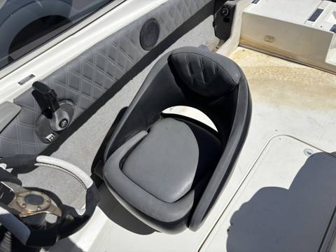 After: diamond-stitched boat captain seat by helm