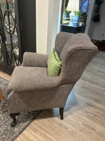 After: gray tweed wingback chair with green pillow